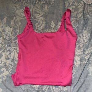 Pink body suit